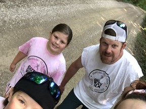 In this family photo, Laci Freiburger and Ben Freiburger (back), along with Del Freiburger and Jenna Redford-Freiburger, take part in this year's Gutsy Walk, which was held virtually due to the COVID-19 pandemic. Crohn's and Colitis Canada hosted the 25th anniversary of the Gutsy Walk on Aug. 23 to raise funds for research into the cures for Crohn's disease and ulcerative colitis. Donations are still open until Sept. 14. Visit gutsywalk.ca for more information.