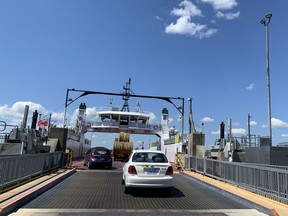 Vehicles board the Wolfe Islander III for a return trip to Kingston. The provincial government announced more than $145 million for the reconstruction of ferry docks in Kingston and Marysville. 
Elliot Ferguson/The Whig-Standard/Postmedia Network