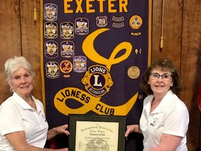 Exeter Lioness members Liz Stephens, left, and Laurie Dykstra hold the Lioness Certificate of Organization. The club recently announced that after 40 years of community service it will be disbanding in October. Handout