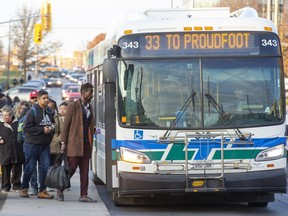 Citizens board an LTC bus on Western Road at Sarnia Road in London, Ont. on Wednesday Nov. 20, 2019. (Derek Ruttan/The London Free Press)