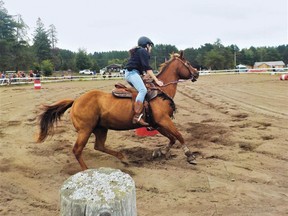 Photo by LESLIE KNIBBS/FOR THE STANDARD
Kelly Woelfly on her horse Jester travelled from Chesley with mother Emma to take part in the Massey Horse Show.