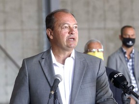 Mayor Al McDonald speaks to the media, Friday, at Norgalv on Roundel Road. Michael Lee/The Nugget