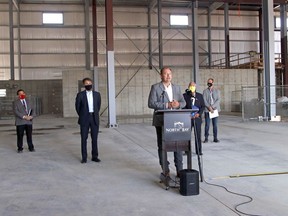 Nickel Belt MP Marc Serré, left, Nipissing-Timiskaming MP Anthony Rota, Mayor Al McDonald, Nipissing MPP Vic Fedeli, and Norgalv Ltd. managing director Andre Van Soelen provide a media availability, Friday, at Norgalv's site on Roundel Road. Michael Lee/The Nugget