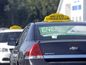 Taxis sit parked at U-Need-A-Cab on Commerce Crescent in this July 2019 file photo. The North Bay Police Services Board has released a draft version of its revised taxi bylaw, with proposed changes around ride-share companies. Nugget File Photo