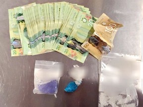 Drugs and cash seized by the OPP after executing a search warrant at a Front Street rental unit in Sturgeon Falls at 11:50 pm Aug. 19.
Supplied