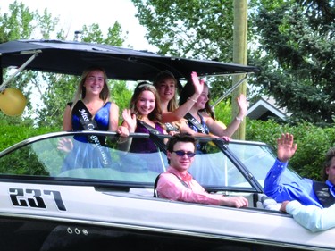 The 2020 J.T. Foster Queen's Ball royalty waves during the Round-Up Days parade Aug. 3.