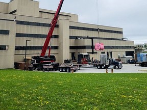 A crane is used to lift a new MRI machine from a truck to its new home at the Owen Sound hospital on Tuesday.
(GBHS photo)