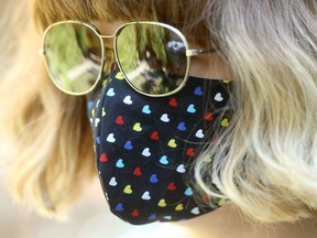 A woman wears a non medical mask, to slow the spread of Covid-19. Winnipeg Sun/Chris Procaylo/stf