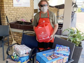 Rick Wharton, manager of Pembroke's Festival Hall Centre for the performing arts, recently delivered treats for the centre's canteen to Chartwell Pinewood Retirement Residence.