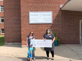 From left, Pembroke Regional Hospital Foundation Week #4  of Catch the Ace Online winner Katelyn Bresseau and her son Riley, are presented with their winnings by PRHF community fundraising specialist Leigh Costello. Submitted photo