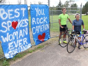 Marianne Carlyle and her son Cameron Carlyle-Locke cycled from the  Leeds and Grenville Animal Centre in Brockville, where Marianne is the manager, to the Renfrew County Animal Centre in Pembroke, a distance of 216 kilometres. The ride was part of the Ontario SPCA Sweat For Pets fundraiser. Anthony Dixon