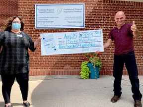From left, Leigh Costello, PRHF community fundraising specialist, congratulates Catch the Ace week number six winner Pierre Brisbois. Submitted photo