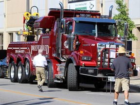Passersby check out Preferred Towing's 2020 Rotator that will debut in season five of the Discovery Canada reality series Heavy Rescue: 401 on Saturday August 22, 2020 in Sarnia, Ont. Terry Bridge/Sarnia Observer/Postmedia Network