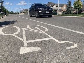 Two city councillors cautioned against rolling back the city's cycling infrastructure after residents of Forman Avenue and Fraser Drive said newly installed bike lanes were creating a different safety issue on their streets. (Cory Smith/The Beacon Herald)