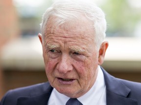 Gov. Gen. David Johnston chats at Spruce Meadows in Calgary, Alta., in 2015. FILE