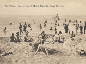 A postcard from the Lambton Heritage Museum collection shows the beach at Grand Bend around 1920. A panel of local museum representatives are talking Aug. 27 about how people used to spend their summers in Sarnia-Lambton. (Handout)