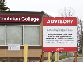 Signs are posted at Cambrian College in Sudbury, Ont. advising the public to follow provincial and municipal COVID-19 directives on campus property. The virus has affected varsity sports at Cambrian, Laurentian University and cambrian College.