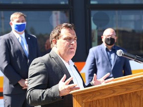 Nickel Belt MP Marc Serre makes a point at a joint federal, provincial and municipal funding announcement for public transit projects in Sudbury, Ont. on Thursday August 6, 2020.