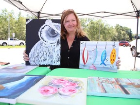 Local artist Brigitte Labby displays some of her artwork at the Sudbury Market in Sudbury, Ont. on Thursday August 6, 2020. Labby just started to paint in March when she became bored after being laid off because of the COVID-19 pandemic. The market is open Saturday from 8 a.m. to 2 p.m., and on Thursday from 2 p.m. to 6 p.m. at the York Street parking lot.