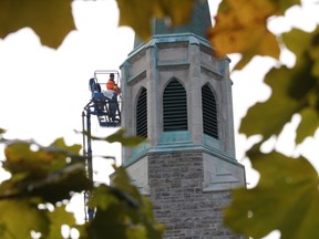 In this file photo, restoration work is underway at St-Jean de Brebeuf Church on Notre Dame Avenue in Sudbury. The church steeple and the exterior of the rectory are being restored.