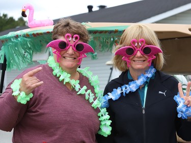 Arlene Byrnes, left, and Ginette Durling thought it would be fun to dress up in costumes while participating in a golf tournament at Timberwolf Golf Club's ladies' open two person scramble in Sudbury, Ont. on Tuesday August 18, 2020. The one-day tournament featured 21 teams. John Lappa/Sudbury Star/Postmedia Network