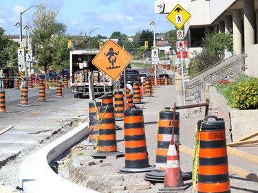 Curb replacement and road work continues on a section of Shaughnessy Street and Brady Street in Sudbury, Ont. on Wednesday August 19, 2020. The construction is causing intermittent lane closures and sidewalk closures until Oct. 31. Traffic control is in place for motorists and there are detours for pedestrians. John Lappa/Sudbury Star/Postmedia Network