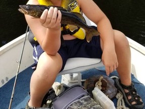 Hunter Howe, 13, enjoys fishing with his family and his respite worker. The boy's bike and fishing gear were stolen earlier this week from a home in the Caruso Club area. Photo supplied by Katrina Howe