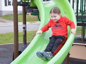 Ryker Aubin, 5, goes for a slide at the Louis Street Tot Lot. The weather for Thursday calls for rain and a high of 21 degrees C. Jim Moodie/Sudbury Star