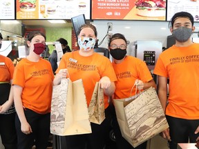 Long Lake Road A&W staff were busy filling orders during A&W Canada's first-ever Take Out Burgers to Beat MS Day in Sudbury, Ont. on Thursday August 20, 2020. A release issued for A&W said, "For every Teen Burger sold across the country via takeout, drive-thru, and delivery, A&W Canada will donate $2 to the MS Society of Canada."