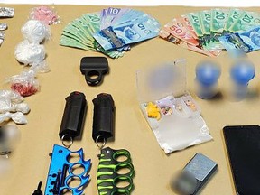 Three people were arrested on weapons and drug-related charges after an OPP drug bust in Espanola. OP photo