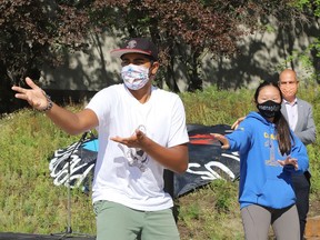 Arjun Shukla, left, leads a Bollywood dance at Fridays For a Future Sudbury celebration of the second anniversary of Greta Thunberg's school strike for climate at the courtyard of Tom Davies Square in Sudbury, Ont. on Friday August 21, 2020. The event also included a Shoe Strike, Parachutes for the Planet, a Zoom broadcast and speeches from youth environmental activists and federal and provincial politicians.