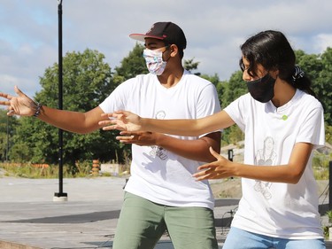 Arjun Shukla, left, and Sophia Mathur lead a Bollywood dance at Fridays For a Future Sudbury celebration of the second anniversary of Greta Thunberg's school strike for climate at the courtyard of Tom Davies Square in Sudbury, Ont. on Friday August 21, 2020. The event also included a Shoe Strike, Parachutes for the Planet, a Zoom broadcast and speeches from youth environmental activists and federal and provincial politicians. John Lappa/Sudbury Star/Postmedia Network