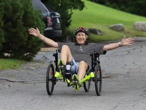Fritz Grottoli goes for a ride on his recumbent bike near his home in Sudbury, Ont. on Friday August 21, 2020.