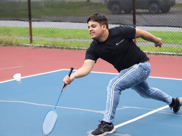 Jiwansh Arora returns a serve during a friendly game of badminton at the pickleball courts at O'Connor Park in Sudbury, Ont. on Tuesday August 25, 2020. John Lappa/Sudbury Star/Postmedia Network