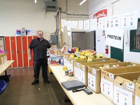 Dan Xilon, executive director of the Sudbury Food Bank, checks over supplies in the warehouse in Sudbury, Ont. on Wednesday August 26, 2020. Xilon provided an update to The Sudbury Star on how things are going at the food bank during the COVID-19 pandemic. He said the Cash for Cans program has been successful and is still running. Xilon said every dollar donated is equivalent to a $6 value in food. The food bank is now accepting some food drives, providing there are health protocols in place. Xilon said the food bank is also looking for a limited number of volunteers.  Organizations and individuals can contact the food bank at sudburyfoodbank@vianet.ca, or by calling 705-671-9663. John Lappa/Sudbury Star/Postmedia Network