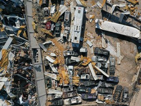 An aerial view taken on August 26, 2020, shows vehicles damaged at the port of Beirut in the August 4 massive explosion that caused severe damage across swathes of the Lebanese capital, killed at least 181 people, injured more than 6,500 and left scores of people homeless.