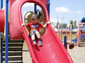 Leo Chartrand, 2, goes down the slide in the playground at Hollinger Park. For those looking to play outdoors, there's good news in the forecast for Thursday and Friday with more sunshine and daytime highs ranging from 26 to 28 C.

RICHA BHOSALE/The Daily Press