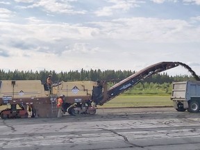 The multi-million dollar resurfacing work is underway on runway 21 at Timmins' Victor Power Airport. The asphalt is completely removed to the gravel. Once collected by dump trucks, the grinded asphalt is re-distributed and graded over various service roads leading to and around the runways. Work is expected to continue and be complete in 2021. Alternate runways remain operational during the construction. 

Richard S. Desjardins/For The Daily Press