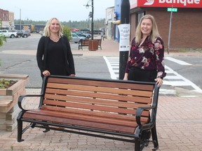 Residents and visitors can relax on the new benches that have been installed on Sixth Avenue .TP.JPG