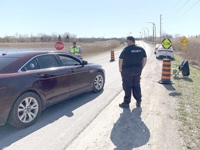 Walpole Island First Nation will not extent the 24-hour bridge checkpoint that has limited almost all non-resident travel into the community since April. (Jake Romphf, Postmedia Network)
