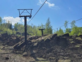 Nitehawk Year-Round Adventure Park officials continue to assess damage caused by a landslide on the ski hill Tuesday, May 19, 2020. The incident occurred in the area of the Temptation run around tower 4 of the lift and it spread onto lower Showoff across the luge track.