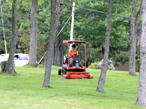 Grass being cut at Bellevue Park in Sault Ste. Marie, Ont., on Tuesday, Sept. 1, 2020. (BRIAN KELLY/THE SAULT STAR/POSTMEDIA NETWORK)