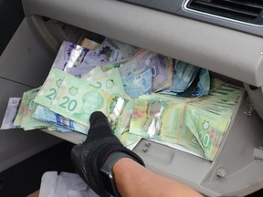 OPP officers seized more than $45,000 in Canadian cash from a vehicle found speeding on Highway 69 near Wanup on Sunday.