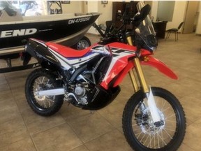 A red 2017 Honda CRF motorbike was stolen Monday from a business on the Kingsway. Police believe it was subsequently involved in a crash on Notre Dame Avenue.