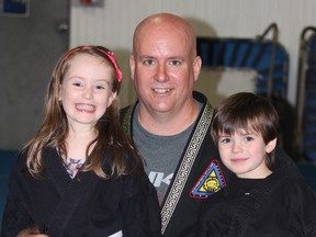 Master Chris Fortin from KMAC in Sudbury with his daughter, Emilie, and son, Eric.