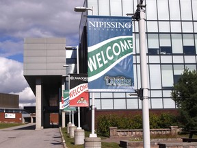 Banners are seen at Nipissing University and Canadore College in August. Classes are set to begin Monday. Michael Lee/The Nugget