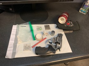 An imitation handgun and narcotics were seized during the traffic stop. SUPPLIED