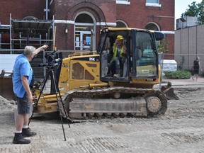 Christopher Cooper, executive producer and owner of Rediscovering Canada Television, directs Lavis Contracting Company workers during the filming of Seaforth’s newest music video parody. Daniel Caudle