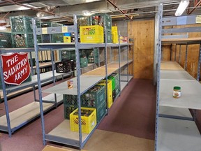 The near-bare shelves of the Salvation Army Food Bank in Grande Prairie earlier this year. Demand had spiked at the food bank due to the COVID-19 pandemic.
