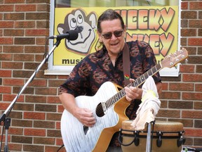 Mike Blackmore serenaded Record Store Day attendees outside Cheeky Monkey on Aug. 29. Handout/Sarnia This Week